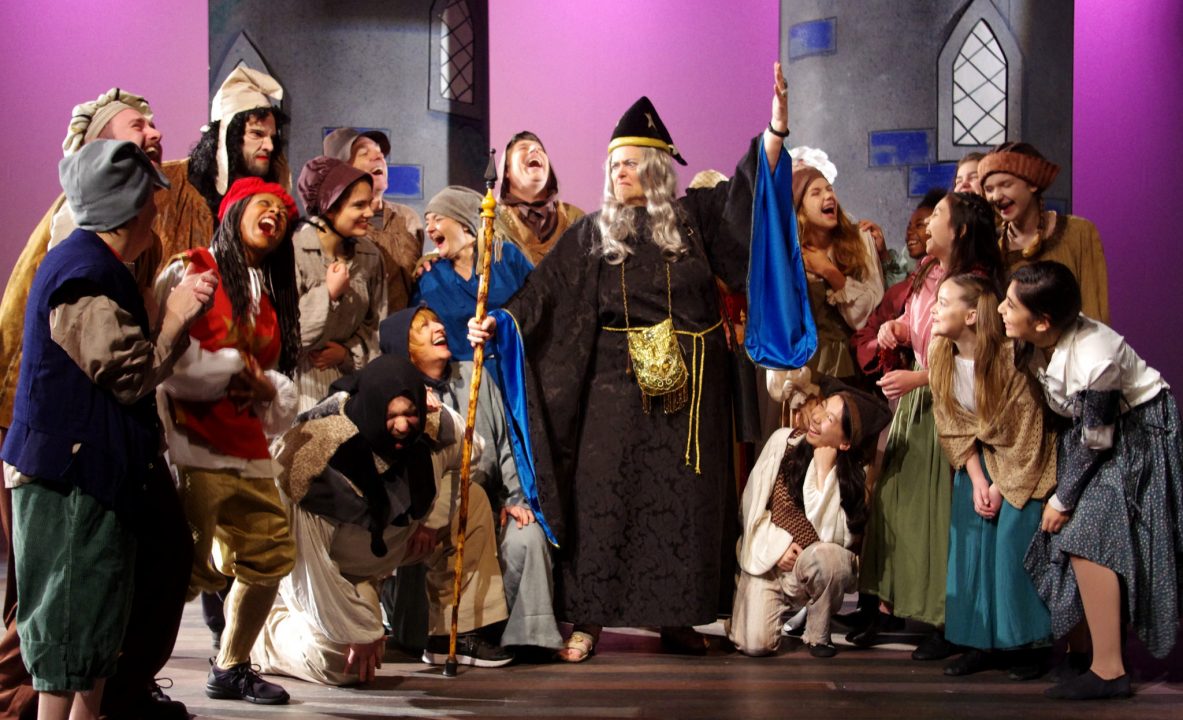 Merlin casting a spell on the cast of King Arthurs Court.