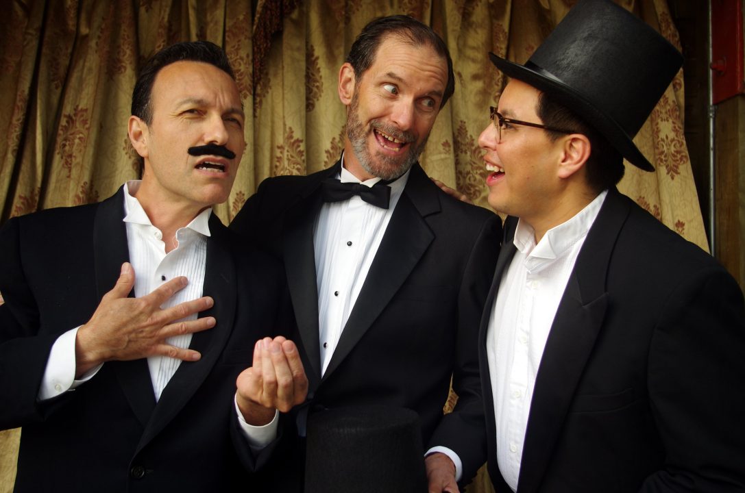 three tenors dressed in tuxes