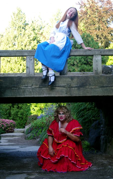 Alice sitting on the Bridge with the Dame plotting something underneath her
